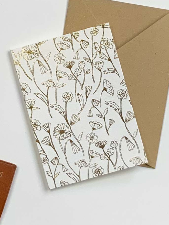 Gold Flower Hot foiled card design. Freestanding